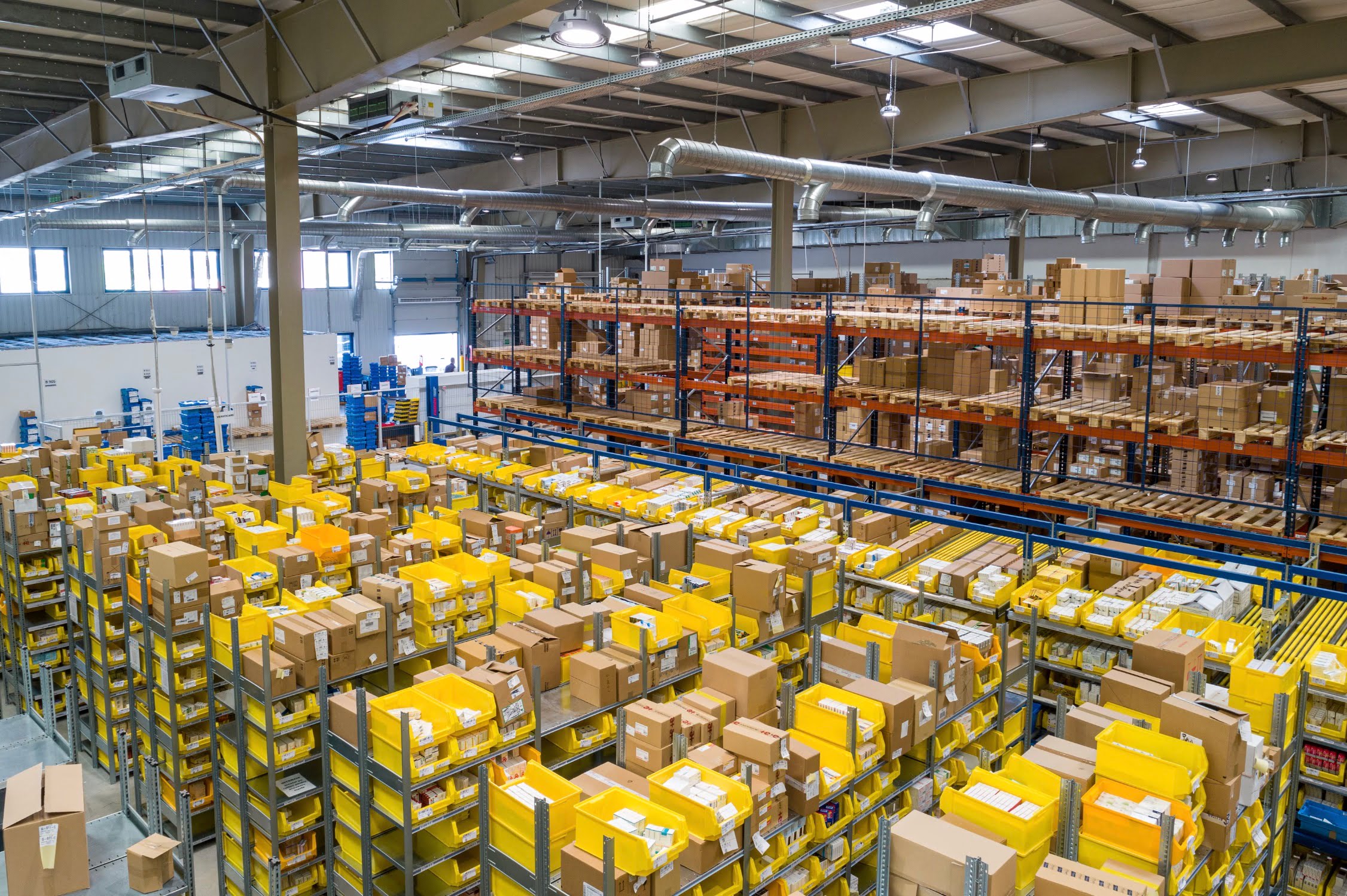 A top down shot of a fulfillment center warehouse similar to the Amazon FBA system