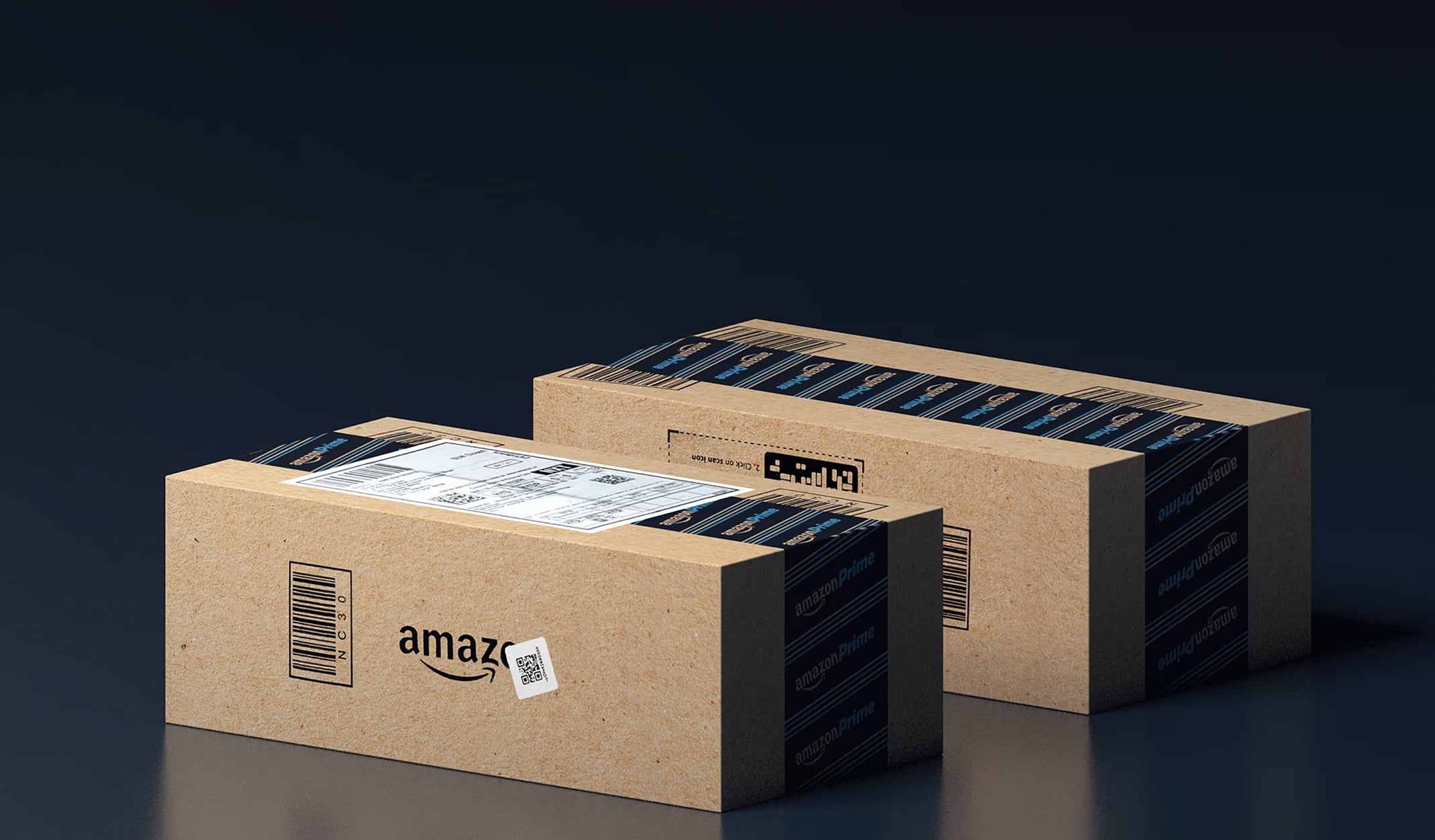 Two Amazon delivery boxes displayed against a dark background